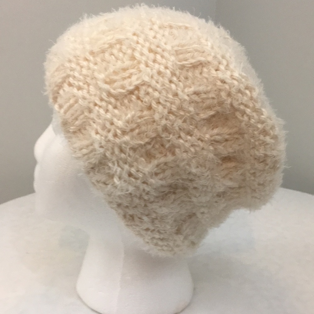 Soft white knitted ponytail hat